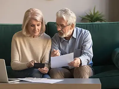 older couple with paperwork